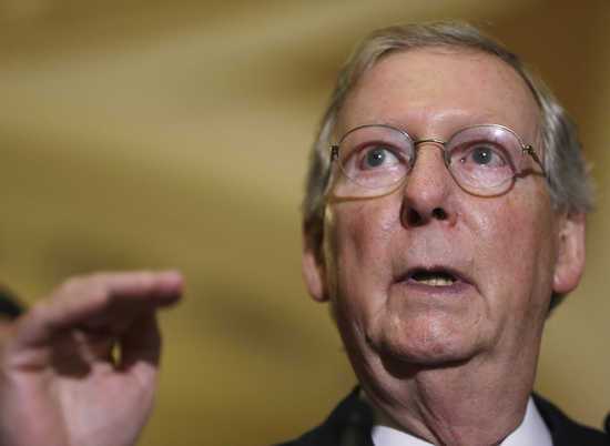 U.S. Senate Minority Leader Mitch McConnell (R-KY) speaks to reporters at the U.S. Capitol in Washington September 24, 2013. Washington faces two looming deadlines, with the Democrats and Republicans far apart on a solution. The U.S. government runs out o