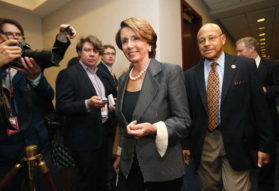 House Minority leader Nancy Pelosi (C) arrives for a lunch meeting with Democratic House members &nbsp;in the U.S. Capitol in Washington October 16, 2013. REUTERS/Kevin Lamarque