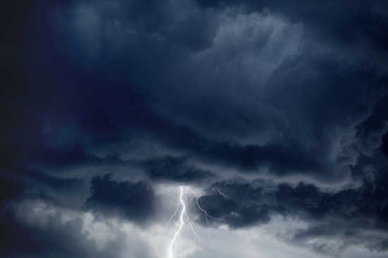 Nature force background - bright lightning in dark stormy sky. 
