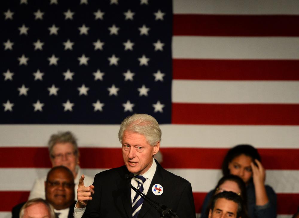 Former president Bill Clinton speaks during a campaign rally for his wife in Silver Spring, Maryland.